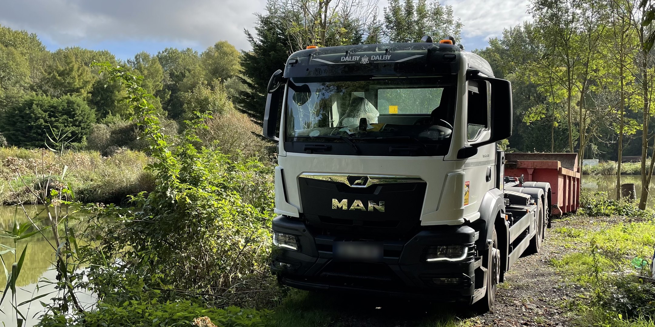 Porteur ampliroll de G-Solutrans sur une tournée